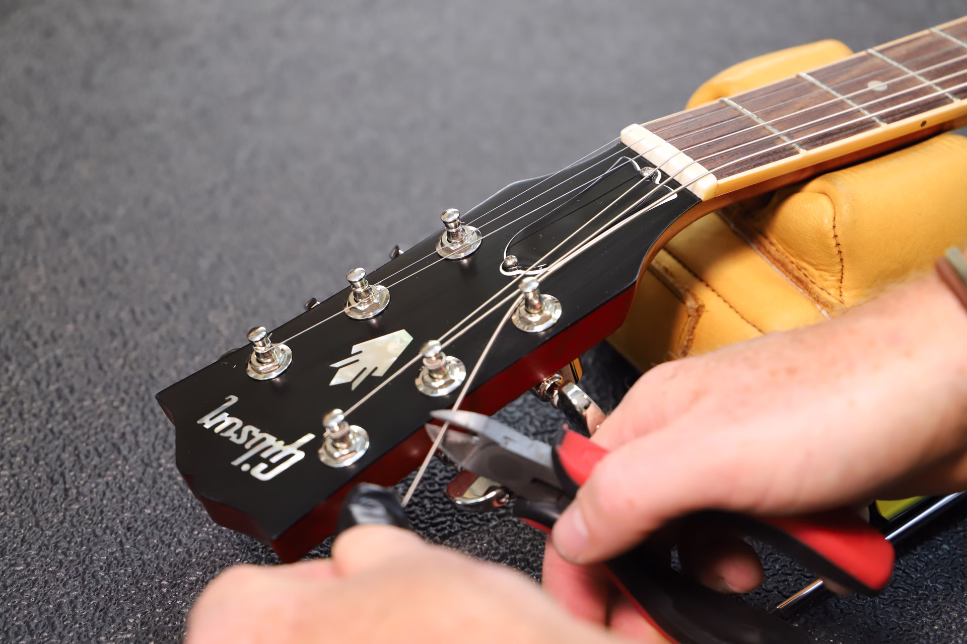 The Definitive Guide to Restringing Your Acoustic Guitar: A 20-Year Guitar Magazine Veteran Shares Their Secrets